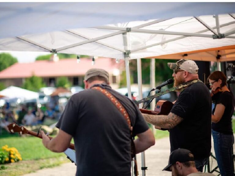 Behind the scenes view of James and Logan performing at Henway.