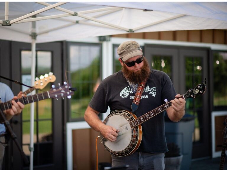 James playing banjo outdoors at Henway