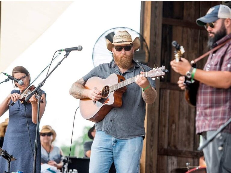 Stacey, Logan, and Corey on stage at Appaloosa Fest