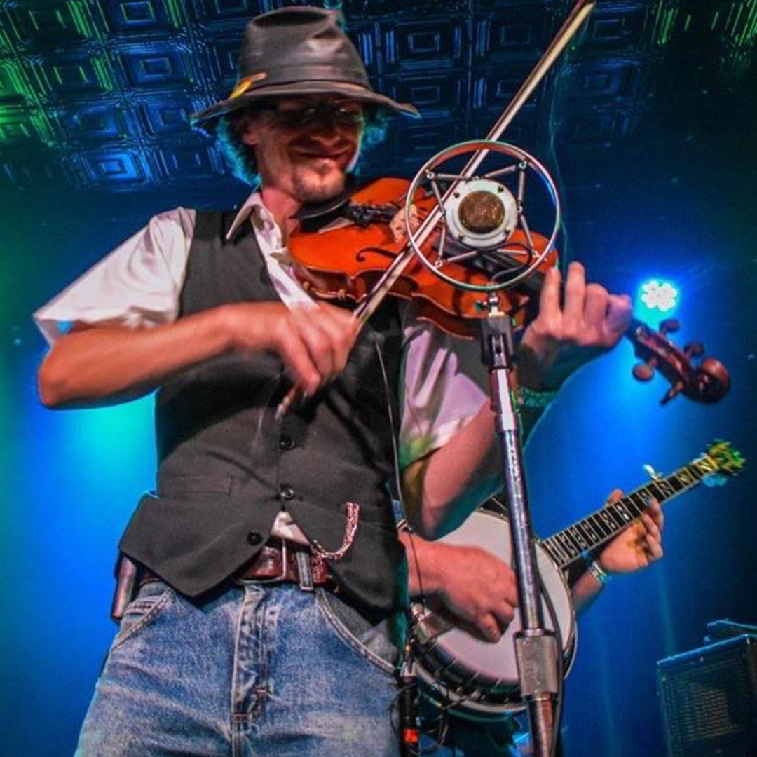 Fiddle player for Hillbilly Gypsies performing at a single mic